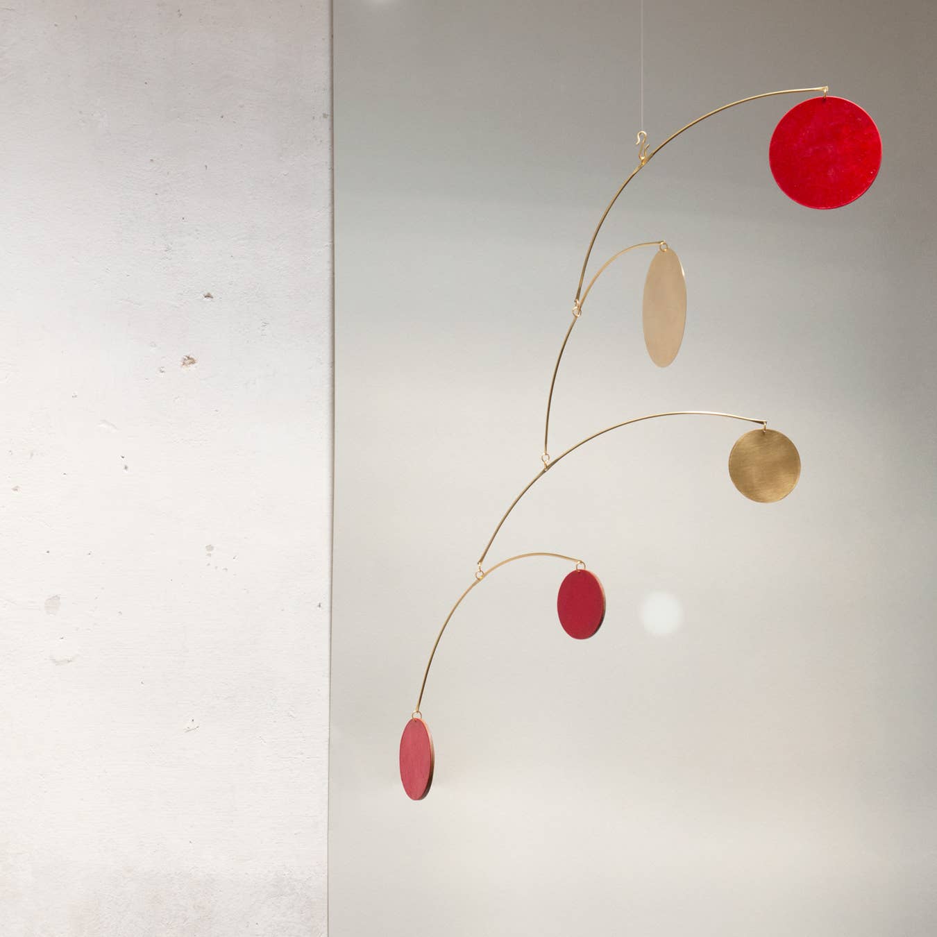 Kinetic mobile Circle handmade with brass and recycled paper: Red