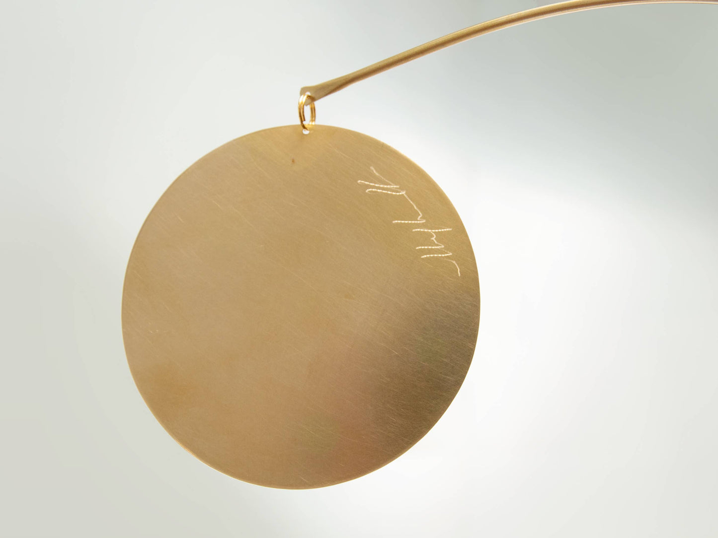 Kinetic mobile Circle handmade with brass and recycled paper: Red